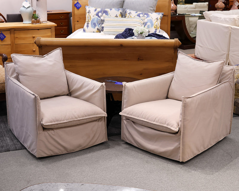 Pair of Beige Performance Fabric Swivel Chairs.