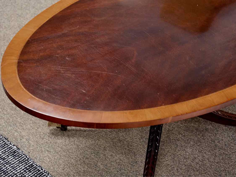 Kindel  Mahogany Pedestal Cocktail Table with Banded Inlay Top & Casters