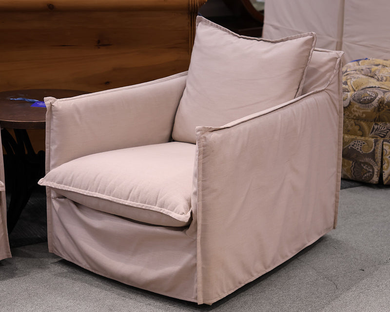 Pair of Beige Performance Fabric Swivel Chairs.