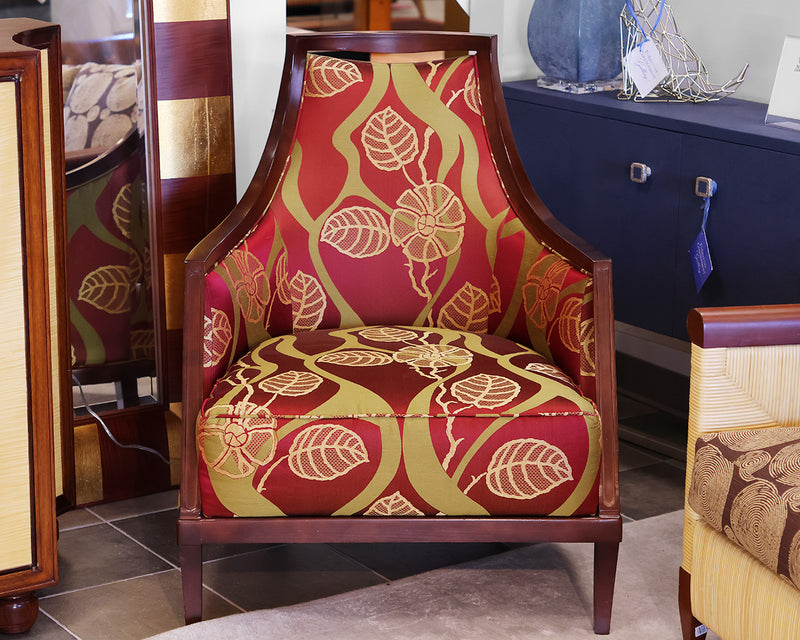 accent chair. Burgundy, sage and gold floral fabric. Walnut wood frame with tape