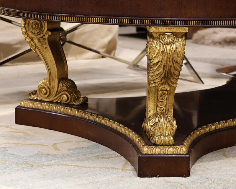 Ornate Oval Mahogany Cocktail Table on Neoclassical Base with Gilded Details