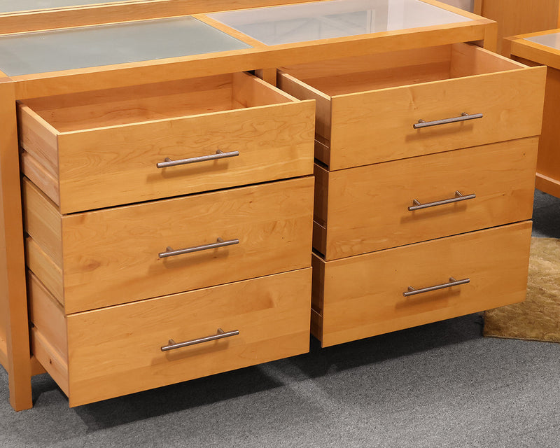 Copeland Dresser Light maple dresser with attached mirror.