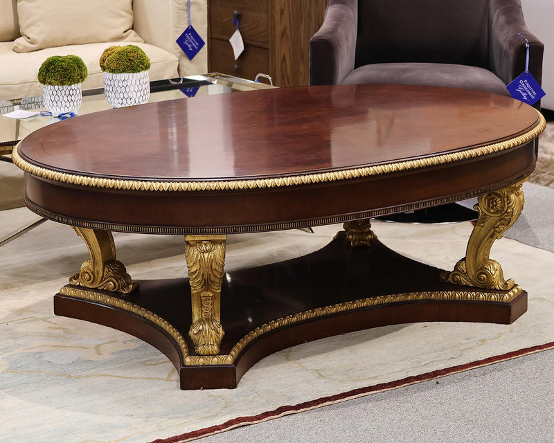 Ornate Oval Mahogany Cocktail Table on Neoclassical Base with Gilded Details