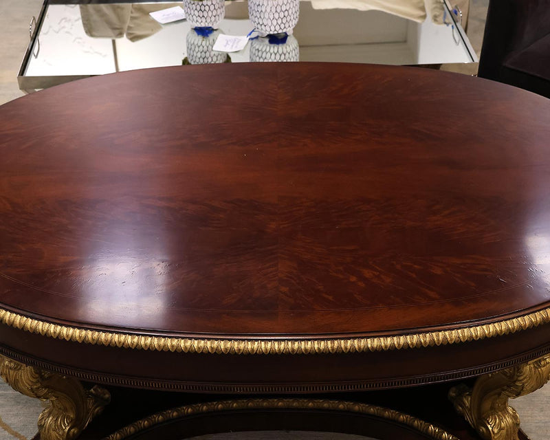 Ornate Oval Mahogany Cocktail Table on Neoclassical Base with Gilded Details