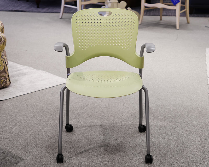 Herman Caper Stacking Chair in Pistachio on Casters