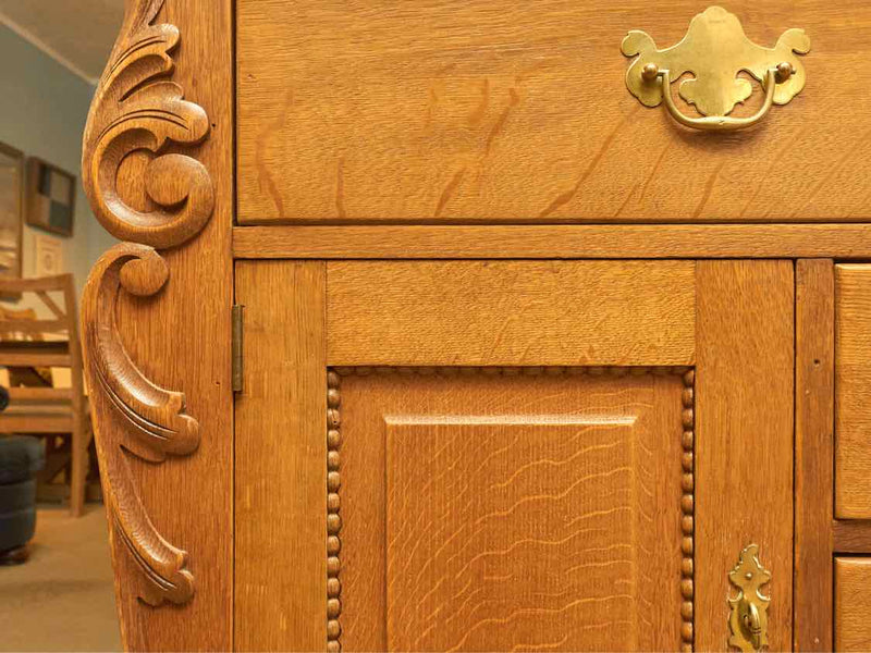 Oak Circa 1880  4 Drawer 2 Door Carved Accents Solid Brass Hardware Sideboard