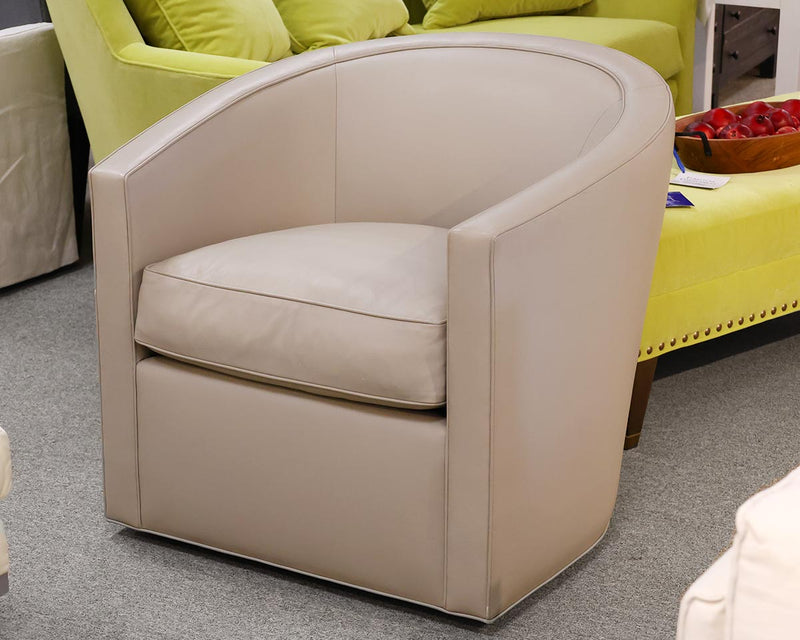 A Rudin Beige Leather Swivel Chair