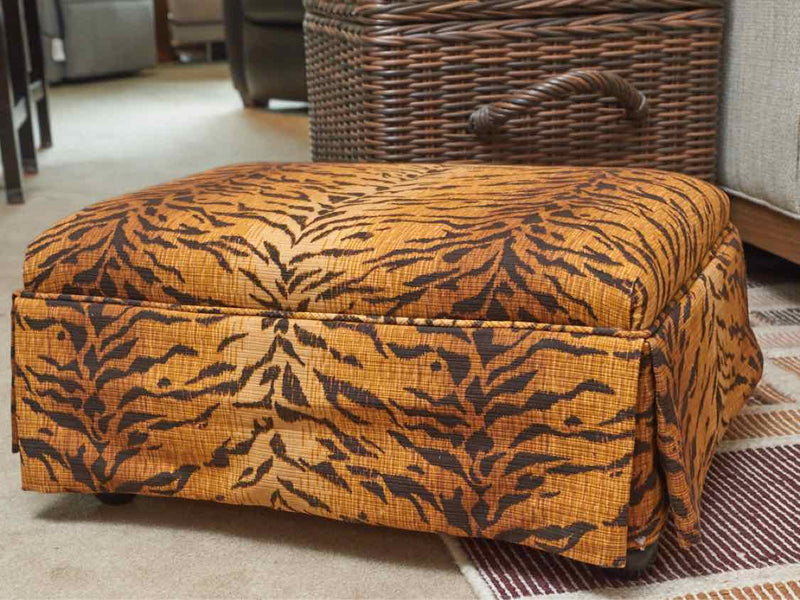 Tiger Upholstered Ottoman with Skirt and Casters