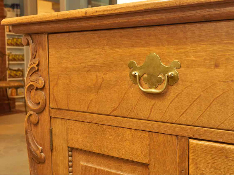 Oak Circa 1880  4 Drawer 2 Door Carved Accents Solid Brass Hardware Sideboard