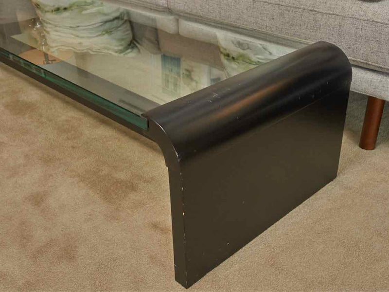 Contemporary Waterfall Shape Glass On Black Finish Base Cocktail Table