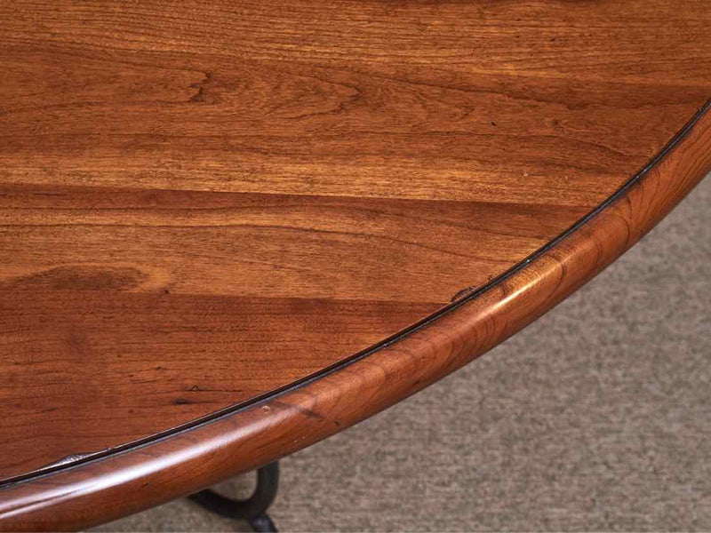 Ethan Allen Round Cherry Top Dining Table with Gun Metal Scrolled Base