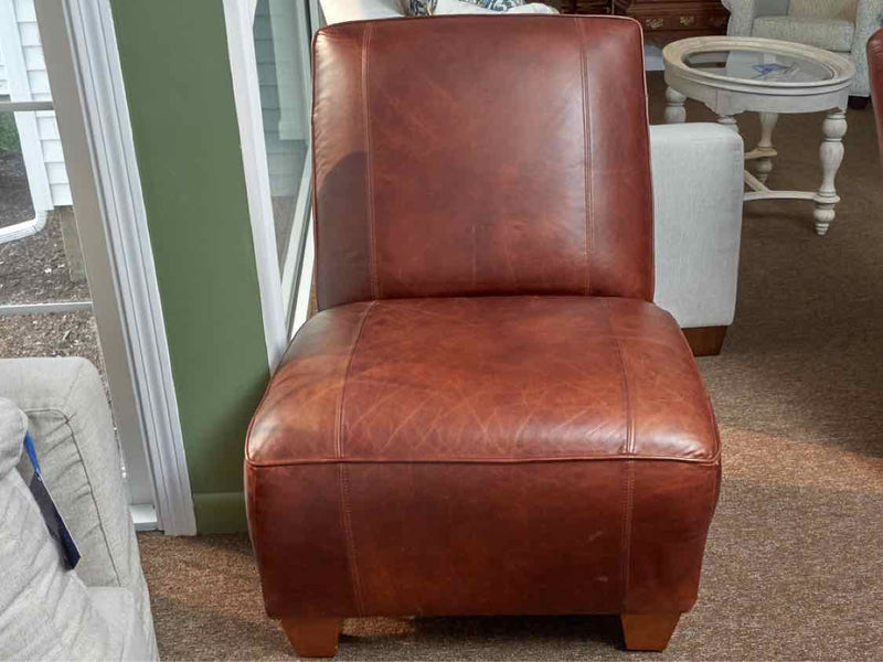 Pair Of Coco Brown Leather Armless Chairs