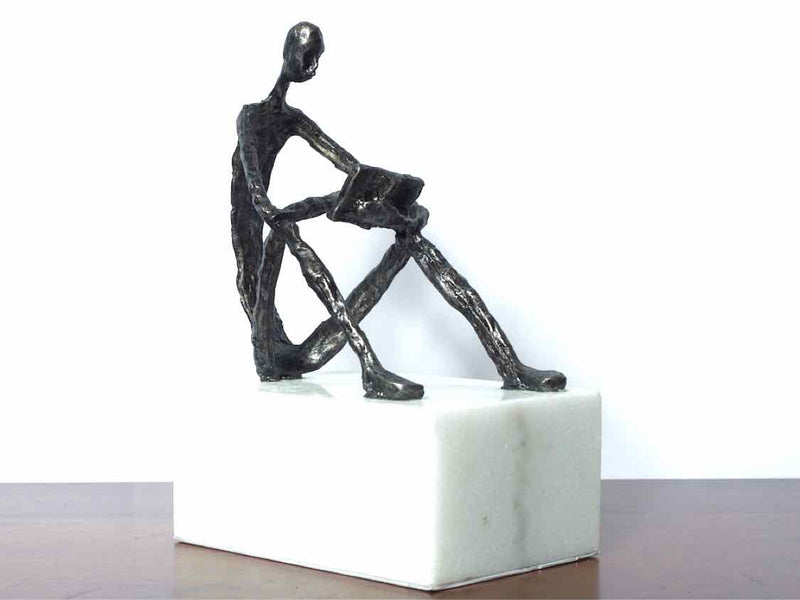 'Sit Back, Relax and Read' Sculpture