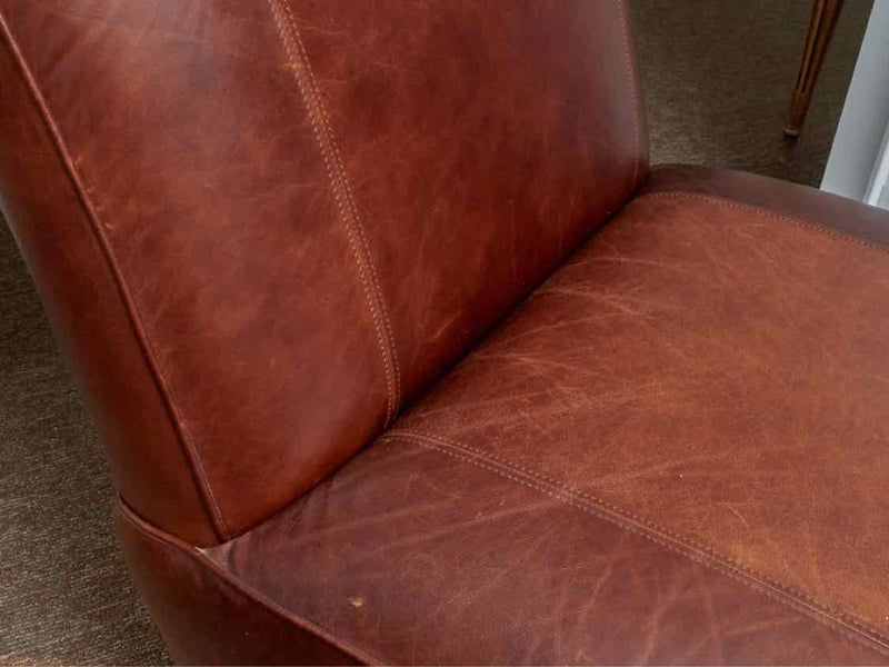 Pair Of Coco Brown Leather Armless Chairs