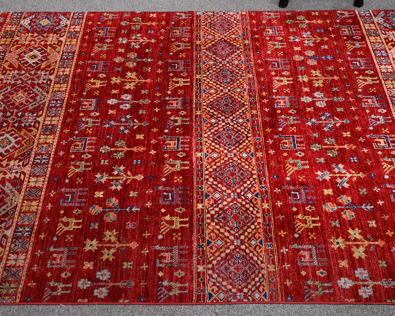 Arijana Wool 5.5 x 8 Area Rug in Dark Red with Flora & Fauna Motif